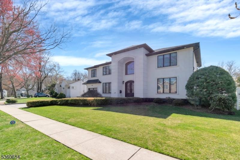 This exquisite home surpasses expectations with its luxurious details and practical accents.