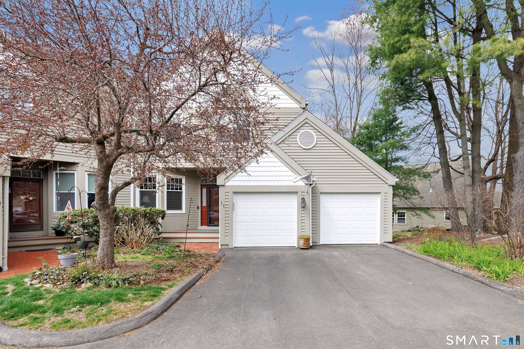 Opportunity knocks ! Impeccably maintained 2 bedroom townhouse in desirable Greystone on the Lake complex.