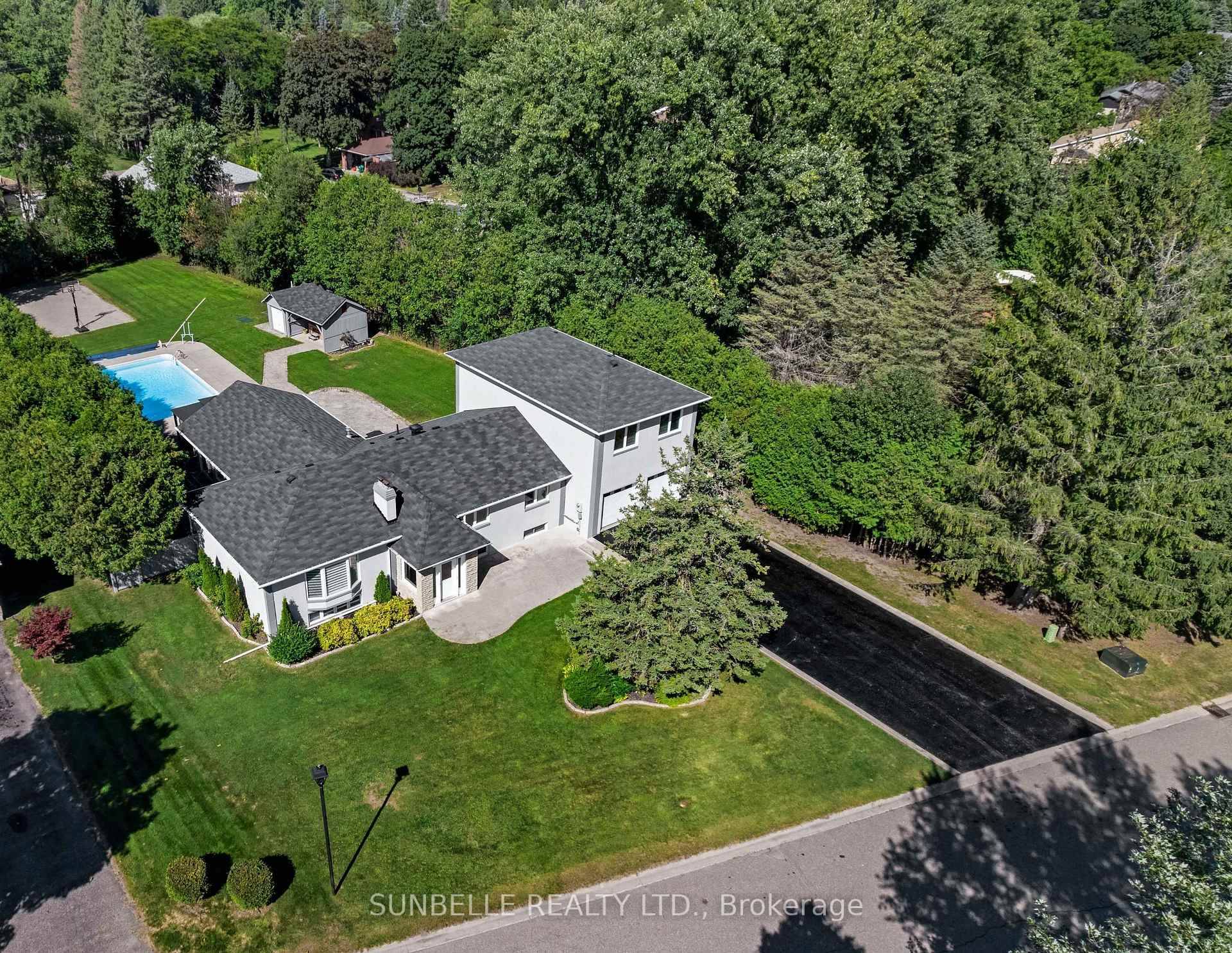 Elegant King City Estate on a Coveted 1 Acre Lot with Expansive 4 CAR GARAGE.