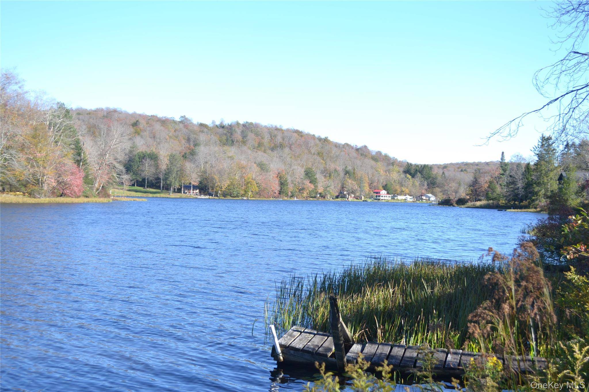 Enjoy fantastic lakefront views from your screened deck and be steps away from your private dock on Lake Muskoday, a non motorboat lake where you can enjoy fishing, paddling, swimming, ...