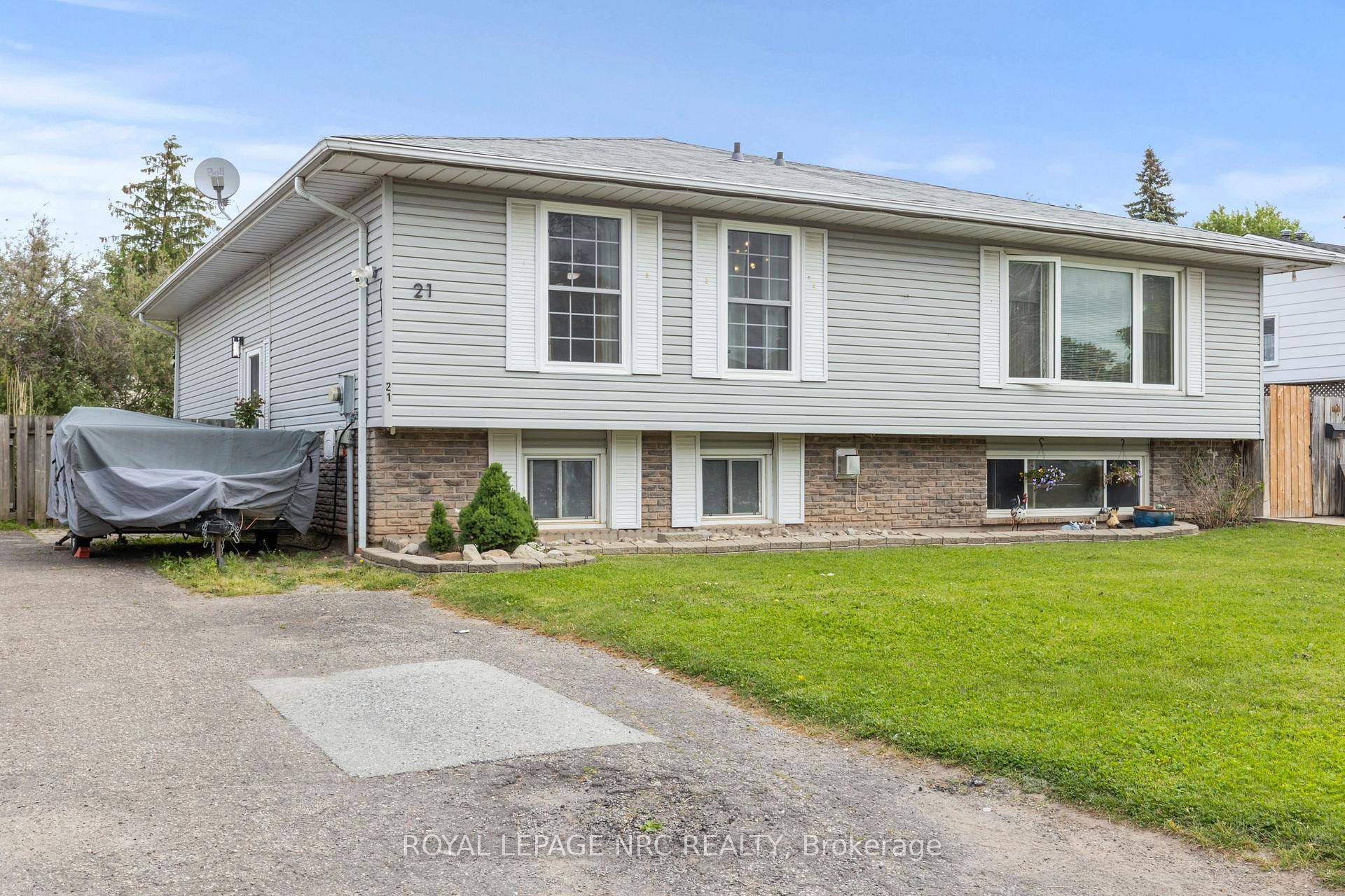 Step inside to discover a bright, freshly painted interior 2024 and large front windows 2024 that flood the living space with natural light.