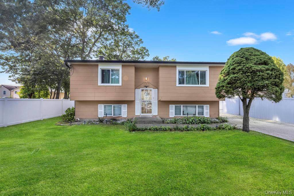 This beautifully maintained 4 bedroom, 2 bath Hi Ranch is located on a quiet, tree lined block in the heart of town.