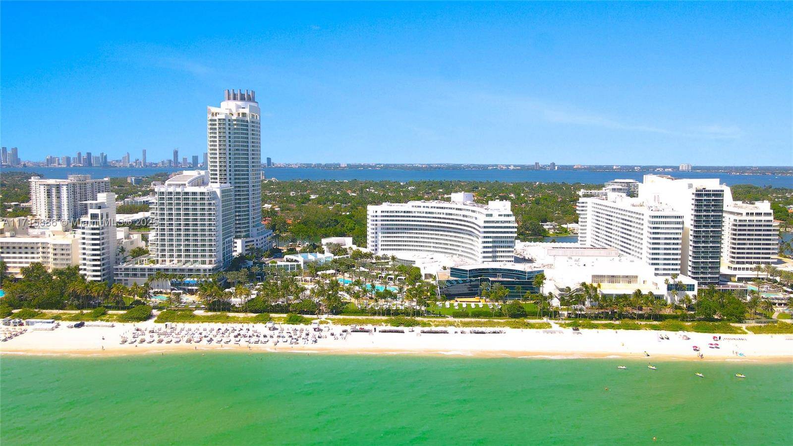 Stunning southeast corner 1 bedroom, 2 bathroom residence at Fontainebleau II, featuring beautiful ocean and city views.