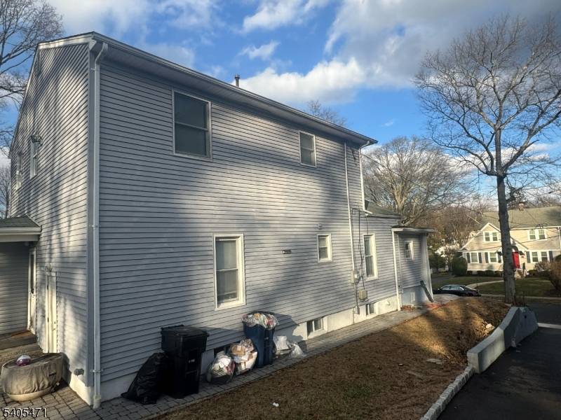 Welcome to this beautiful Colonial that has been thoughtfully updated from top to bottom located on a quiet street in the desirable NETHERWOOD HEIGHTS Historic District in Plainfield.