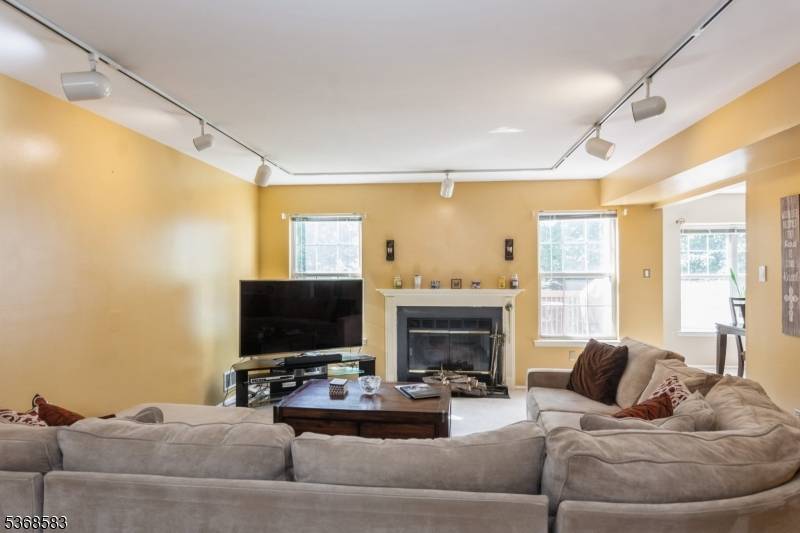 Charming 2 Bedroom Townhouse with Fireplace and Private Deck Welcome to this bright and spacious 2 bedroom, 2.