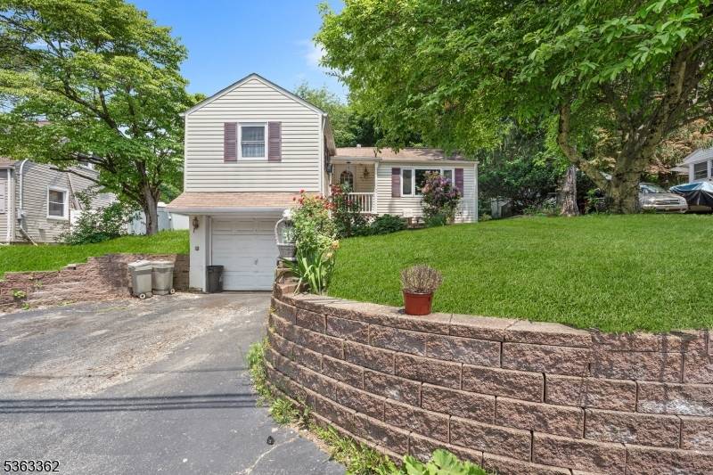 Charming 3 bedroom, 2 bath Ranch nestled on a quiet, tree lined dead end street.