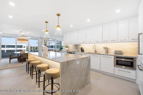 A Palm Beach masterpiece of modern coastal luxury.