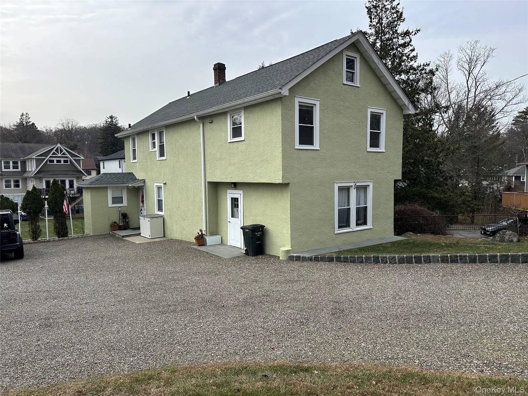 Spacious two bedroom apartment offering heat and hot water included, quietly set back from the street with easy parking.