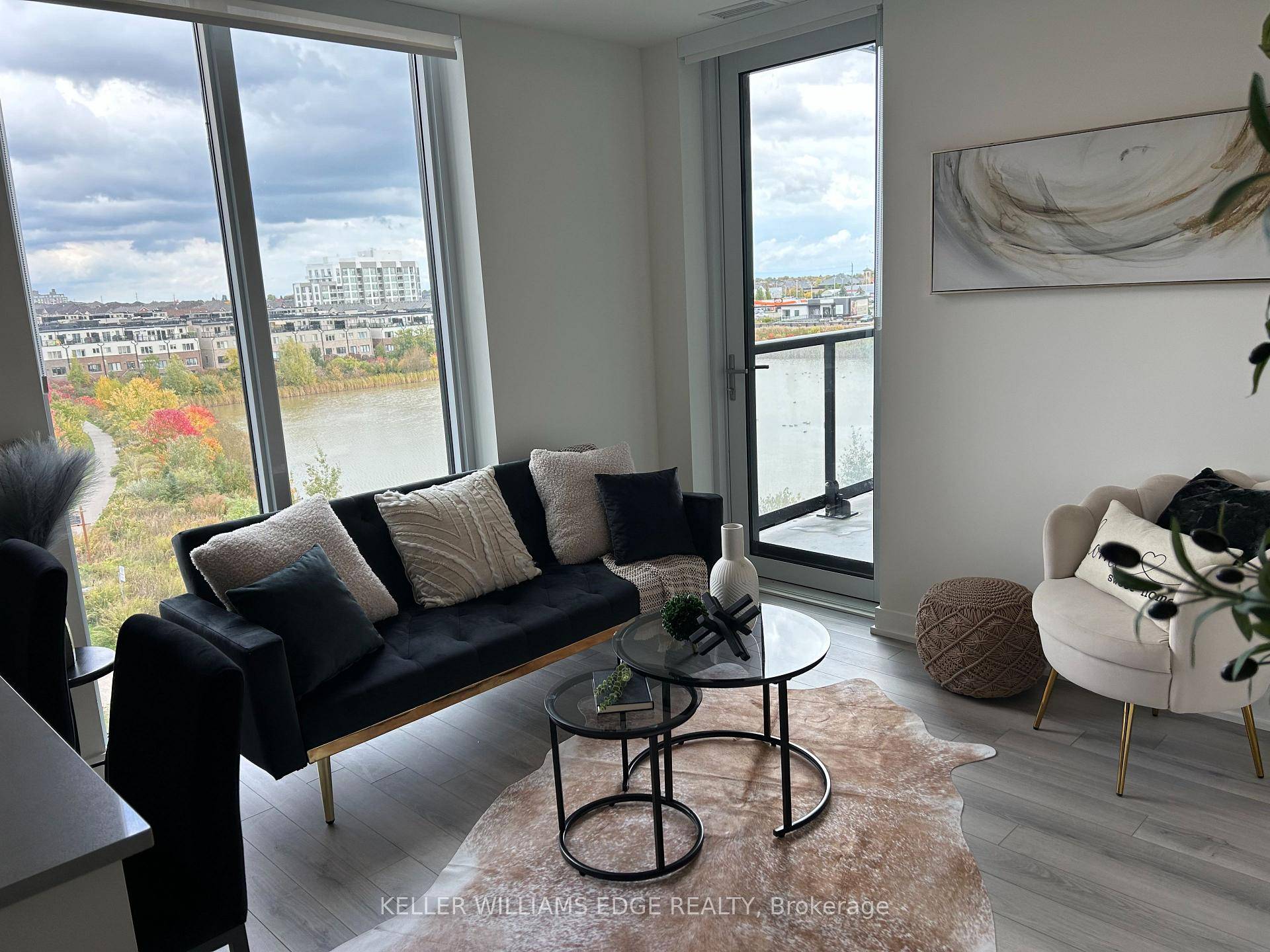 Experience elevated living in this stylish 2 bedroom, 2 bathroom condo overlooking serene pond views and lush green space.