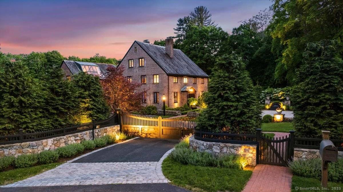 You can stroll into town from 40 Oenoke Ridge, one of New Canaan's most admired and iconic properties, stunningly transformed by its current owners into a showpiece of refined elegance ...
