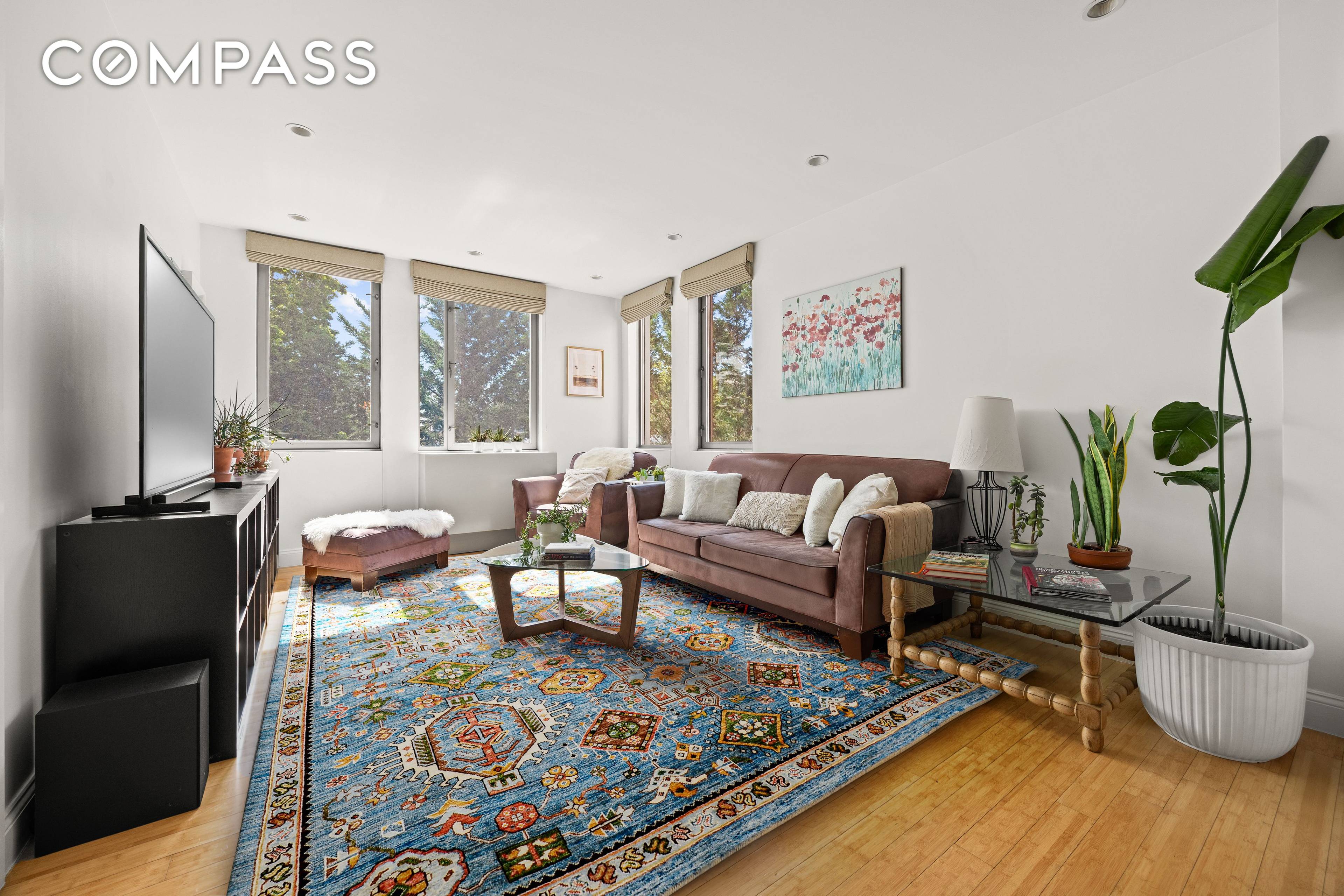 Stunning, sunny and spacious two bedroom condo with an incredible chef's kitchen, complete with a private balcony and it's own deeded parking spot !