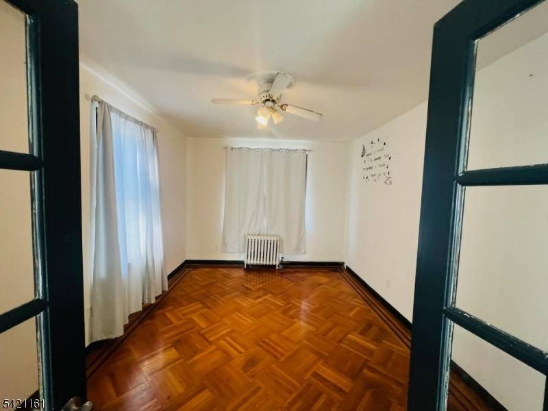 This is two family house with 1 bed, 1 bath in first floor and second floor has 5 bed, 1 full and 1 half bath.