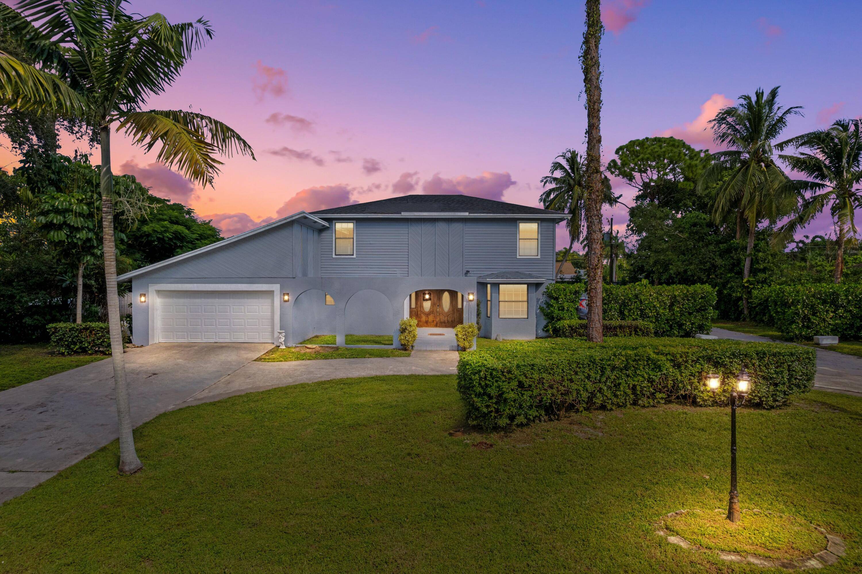 ABSOLUTELY GORGEOUS ESTATE PRIME DELRAY BEACH LOCATION HUGE OVERSIZED LOT Double Door Entrance Bright Open Floor Plan LED Recessed Custom Lighting French Doors Stunning Eat In Kitchen Quartz Counters Center ...