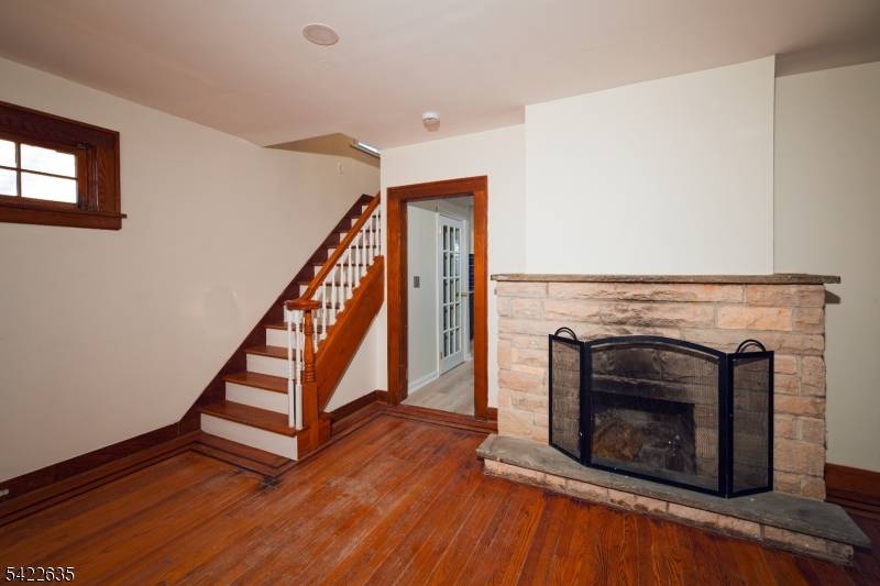 Discover timeless character and modern comfort in this beautifully updated 3 bedroom, 2 bath Tudor style home just minutes from NYC.