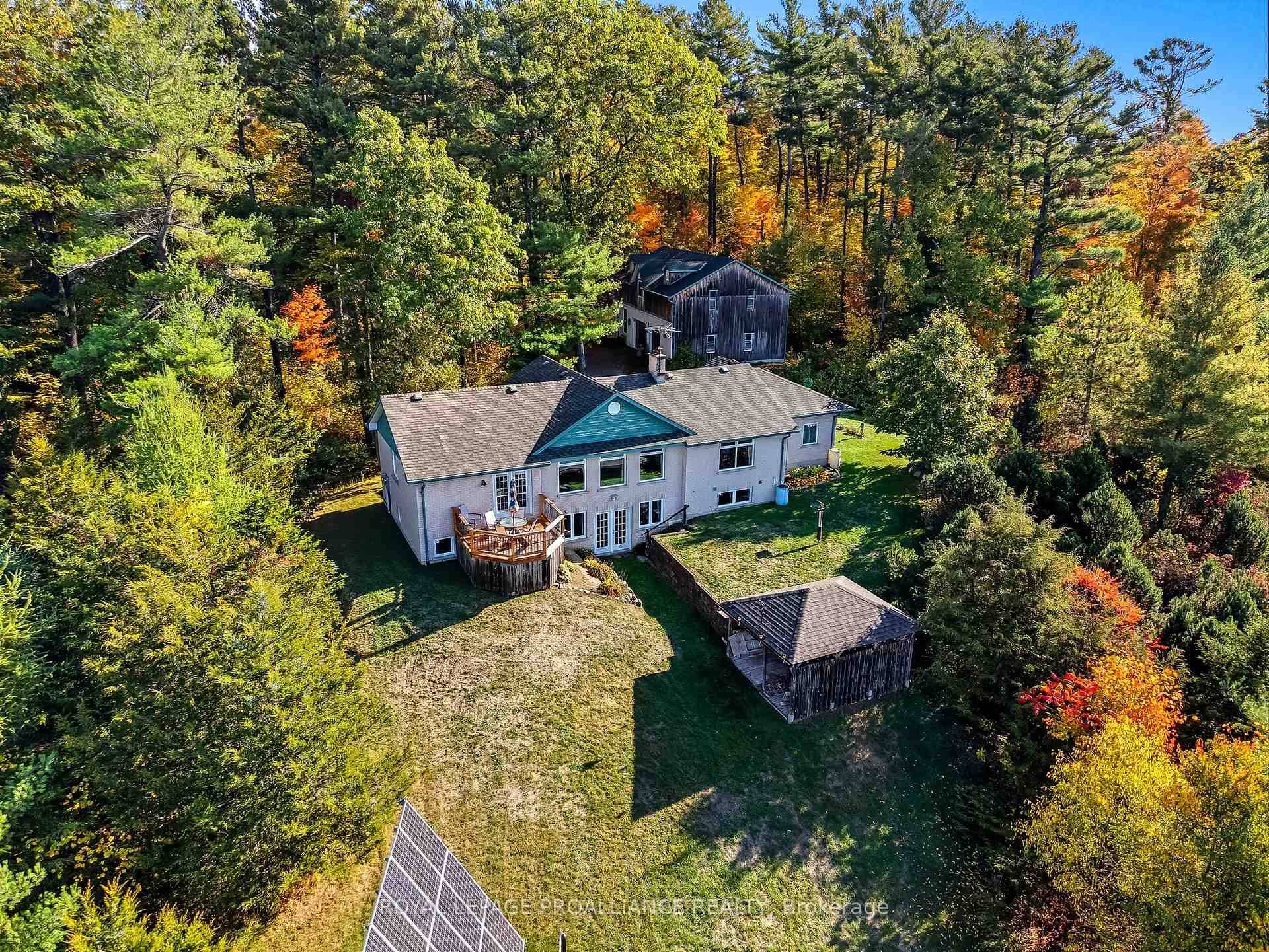 Nestled on 8. 3 acres of peaceful countryside just five minutes from Highway 401, this custom built home offers a rare blend of privacy, nature, and convenience.