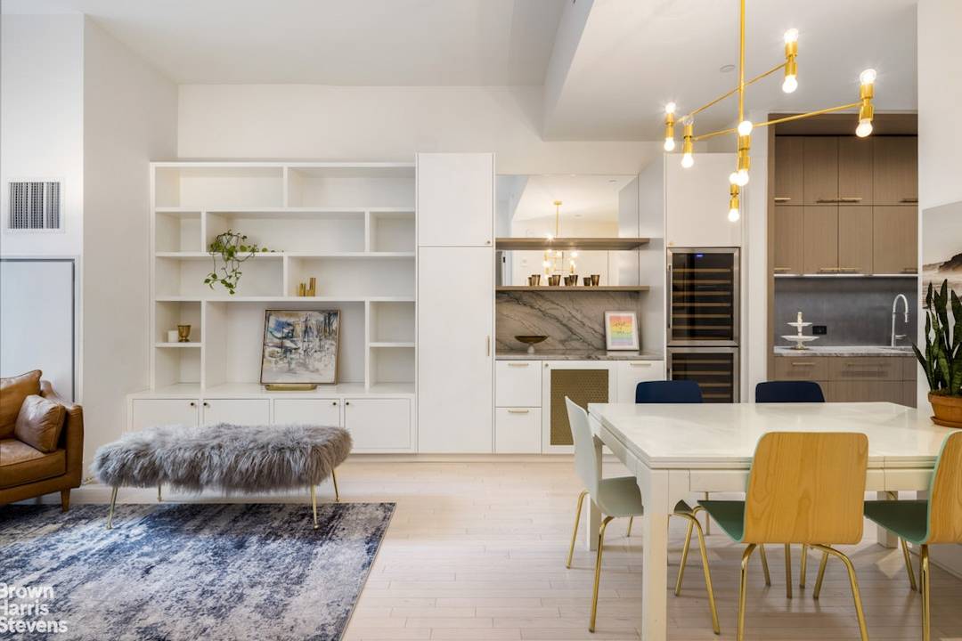 This triple mint corner residence is a refined interpretation of the iconic Tribeca loft aesthetic, featuring slender whitewashed oak plank floors, soaring ceilings, and nearly floor to ceiling windows that ...