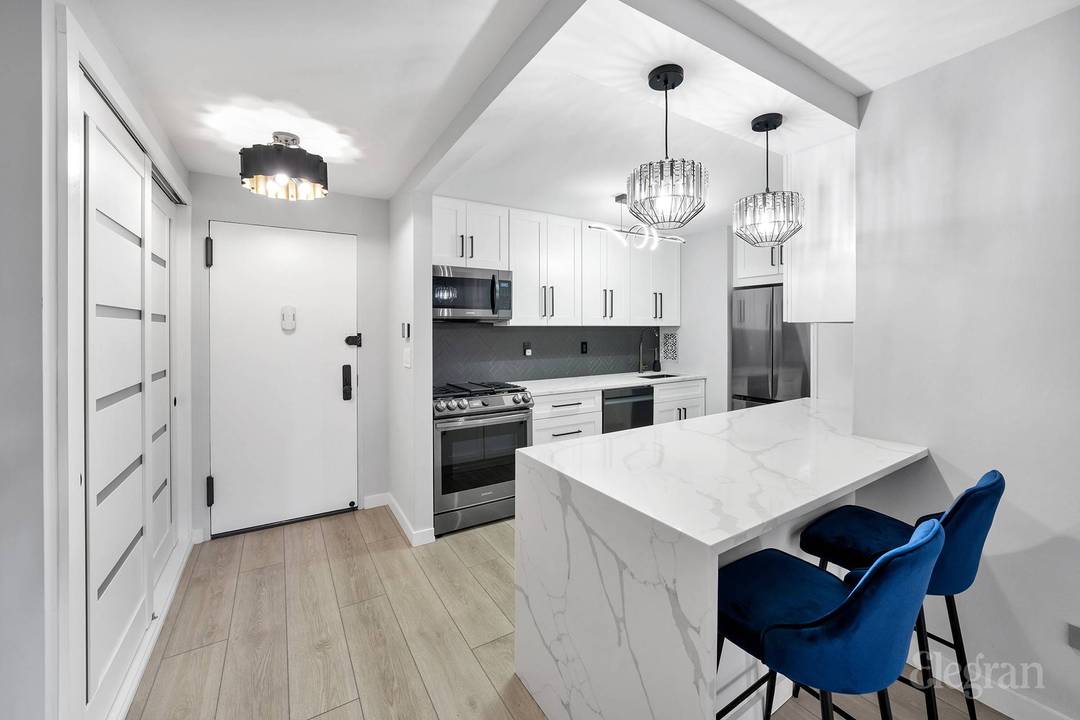 Move right into this gut renovated one bedroom Co Op apartment showcasing a sleek, modern design.