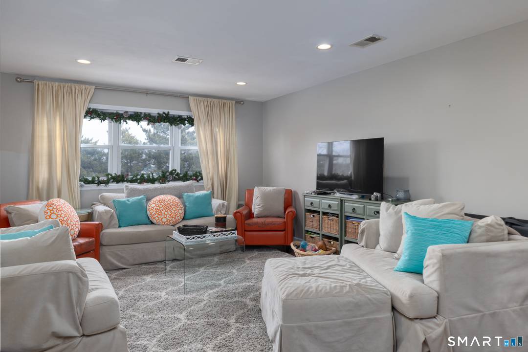 Is there a remodeled 2 bed condo at Walnut Beach with water views and private access ?