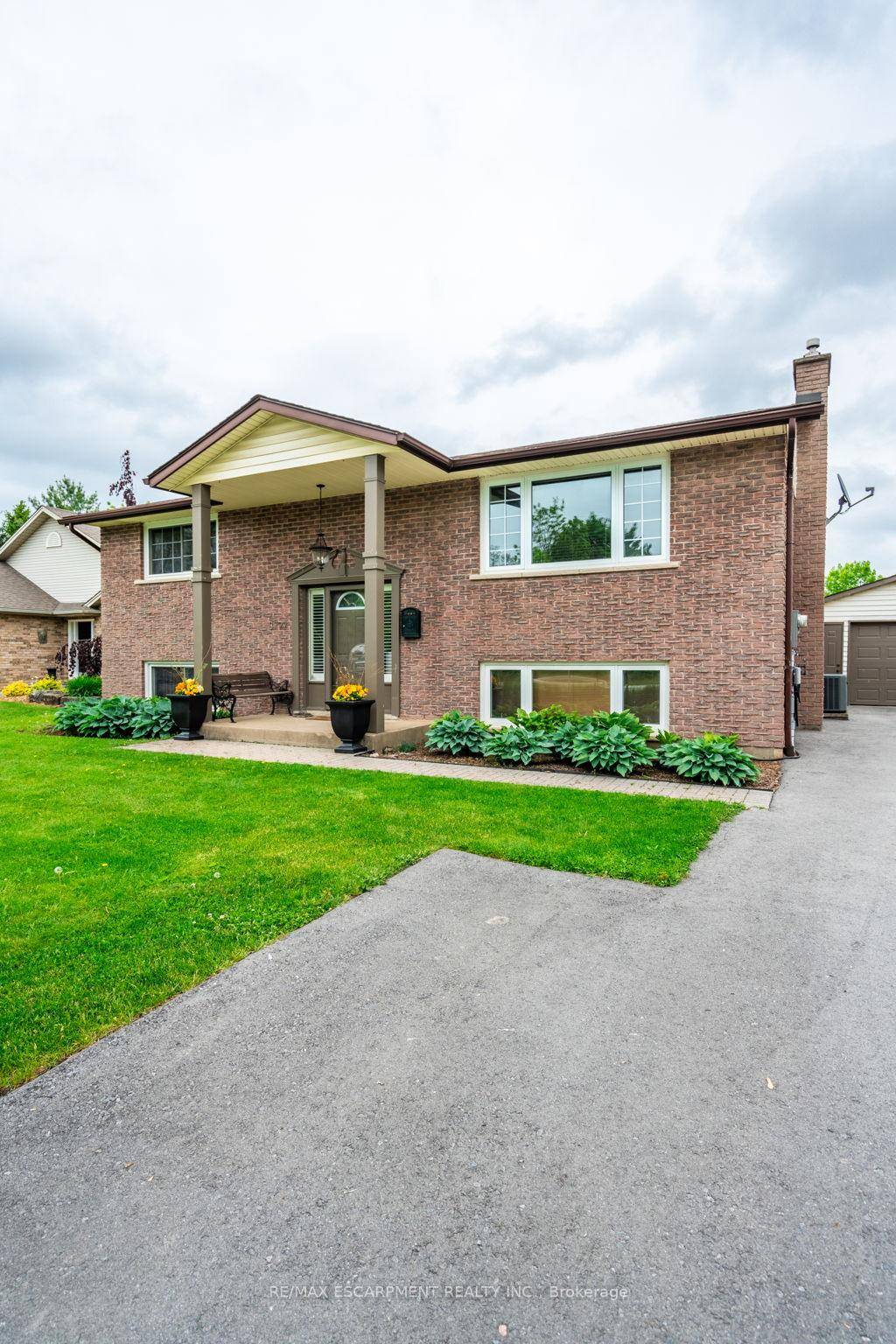 Nestled in the heart of Jordan, this impeccably maintained raised bungalow sits on a stunning 1 3 acre fully fenced, private lot, backing onto a tree farm.