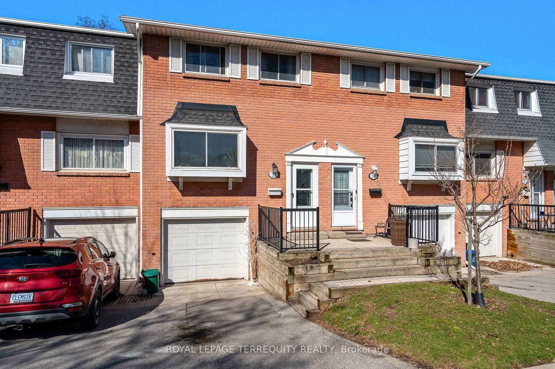 Beautiful well maintained 3 Bedroom condo townhome with large private fenced backyard with gate to greenspace.