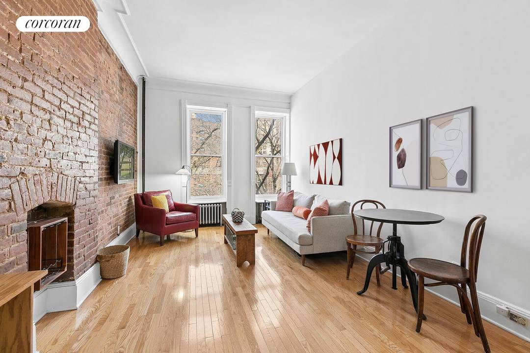 Ready for immediate move in, this charming turn of the century brownstone apartment has been freshly painted and thoughtfully updated throughout.