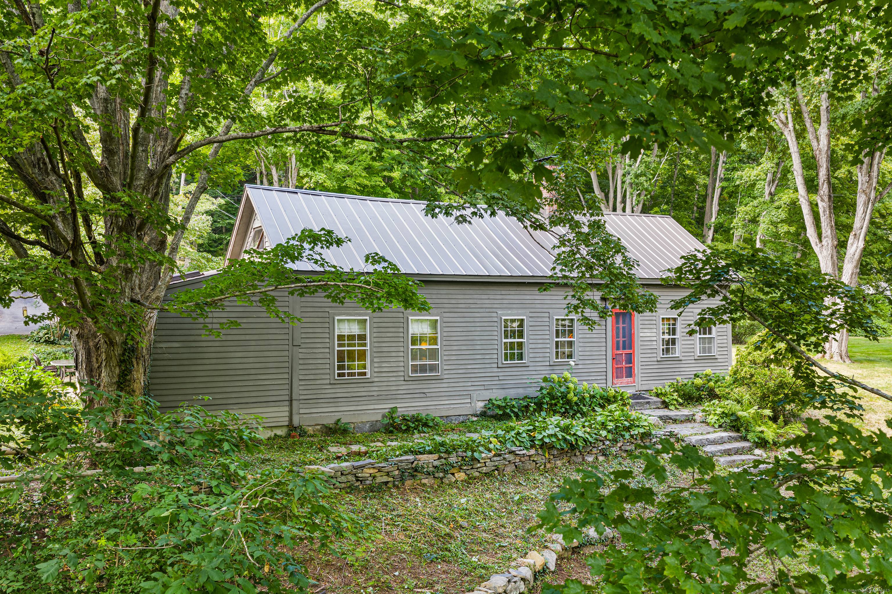 This unique property offers a spacious 3 bedroom, 2 bath main home along with a completely renovated 2 bedroom in law apartment, making it perfect for guests or rental potential.