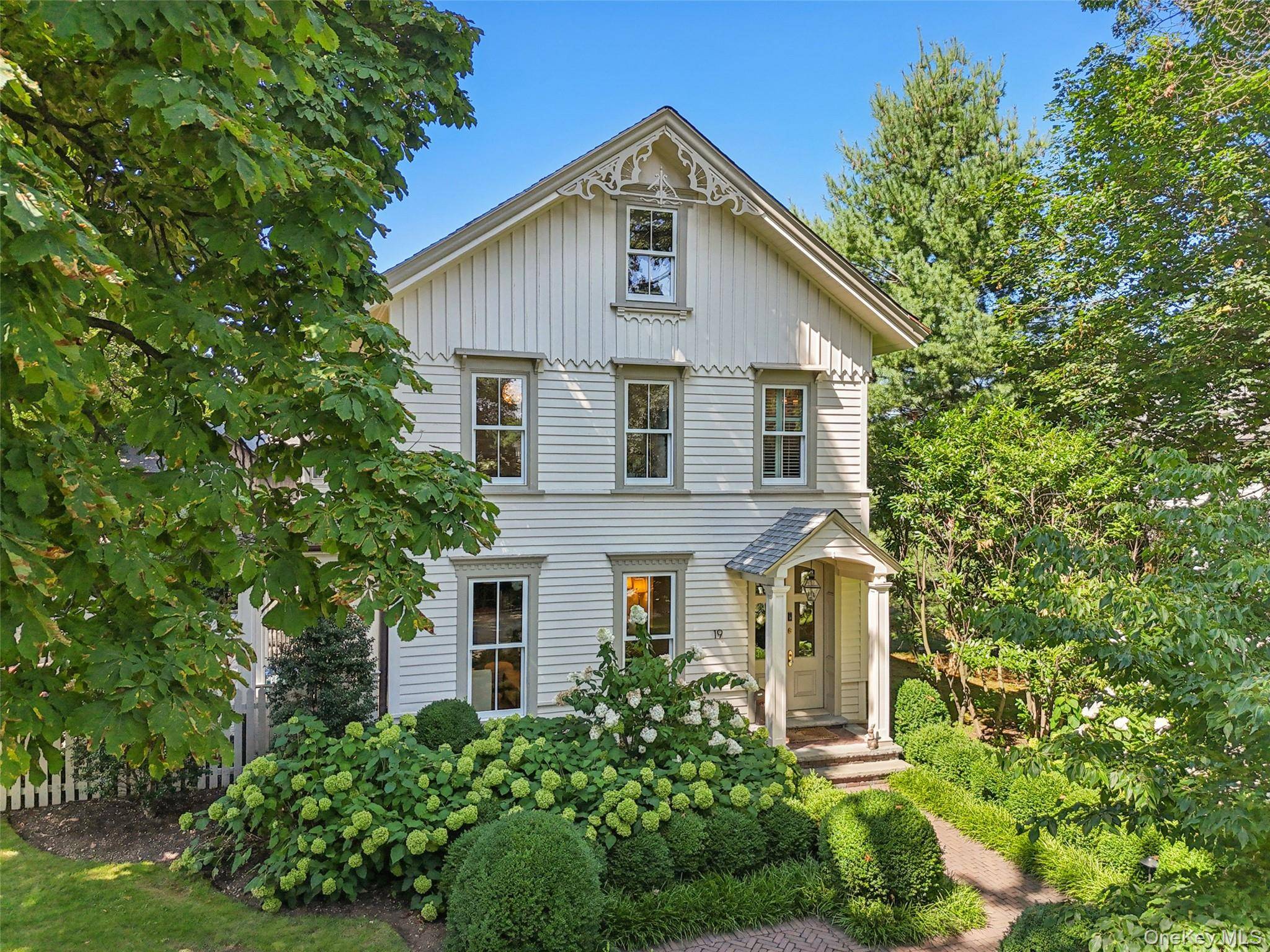 Fall in love with this impeccably renovated 1882 East Williston Estate featuring 4 bedrooms, 4.