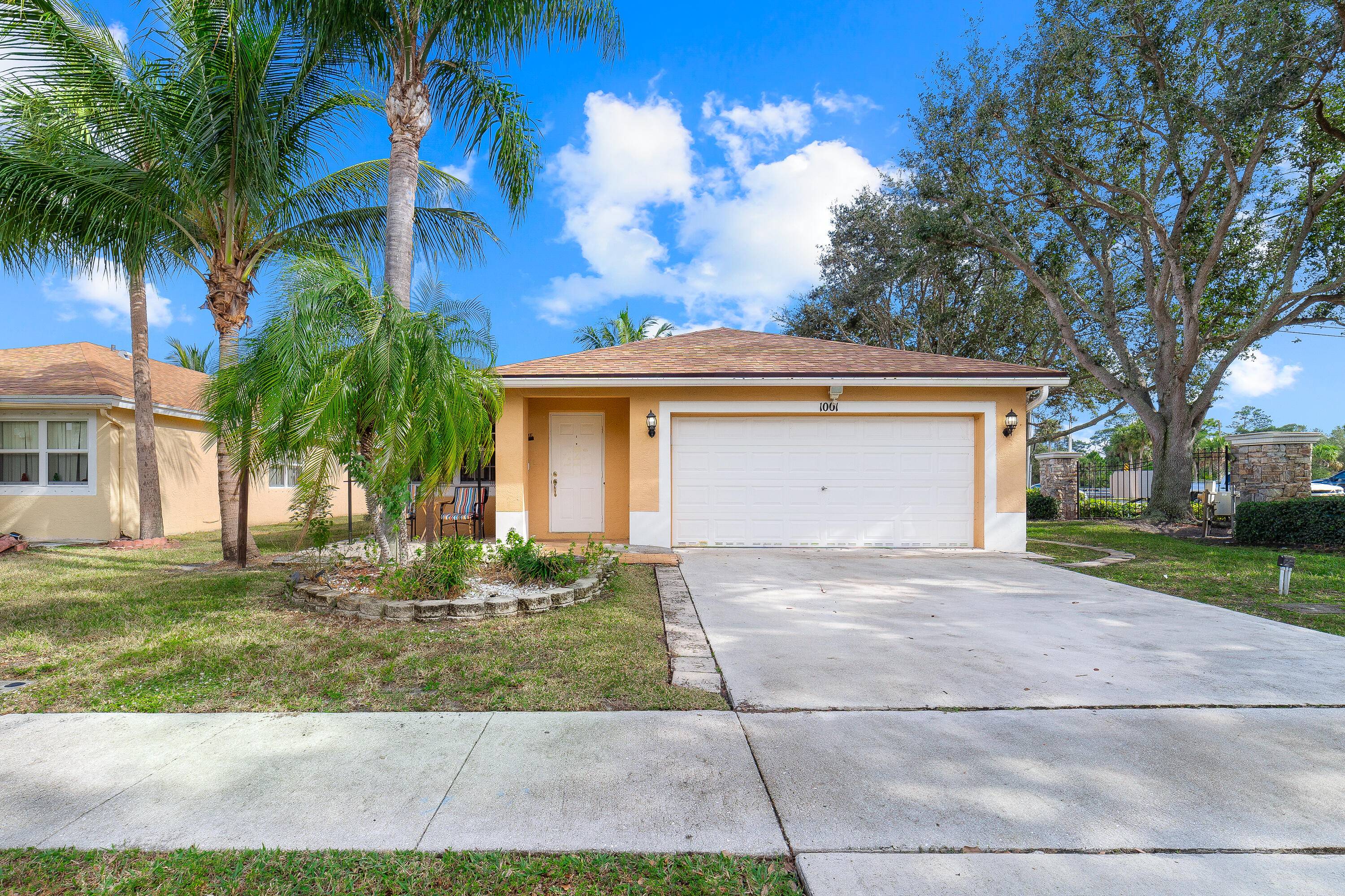 This beautiful 3 bedroom, 2 bathroom, one story home with a 2 car garage rests on a private, fenced in, 0.