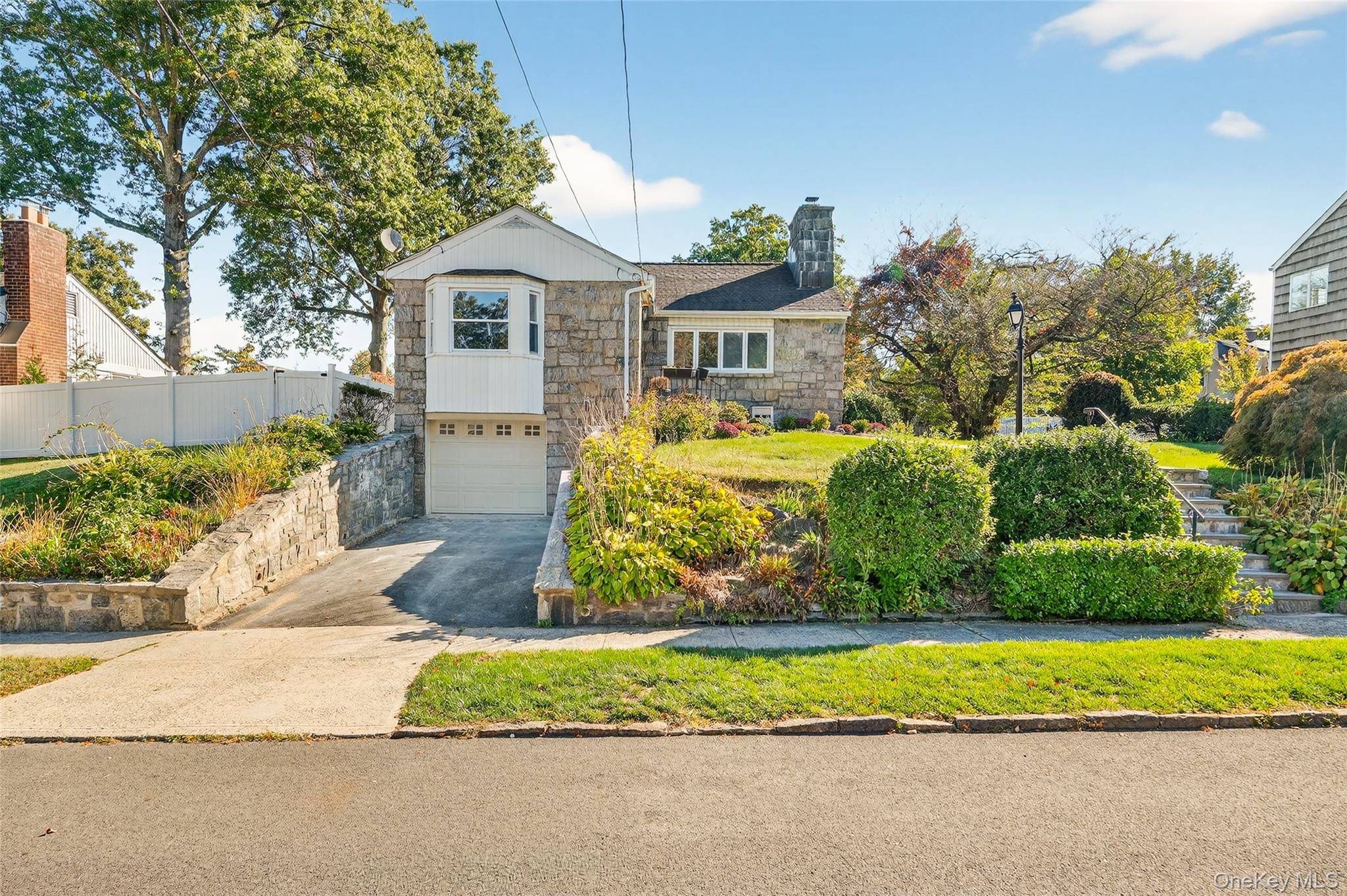 Welcome to this beautifully renovated 3 bedroom, 2 bath ranch perfectly blending modern style and smart living.