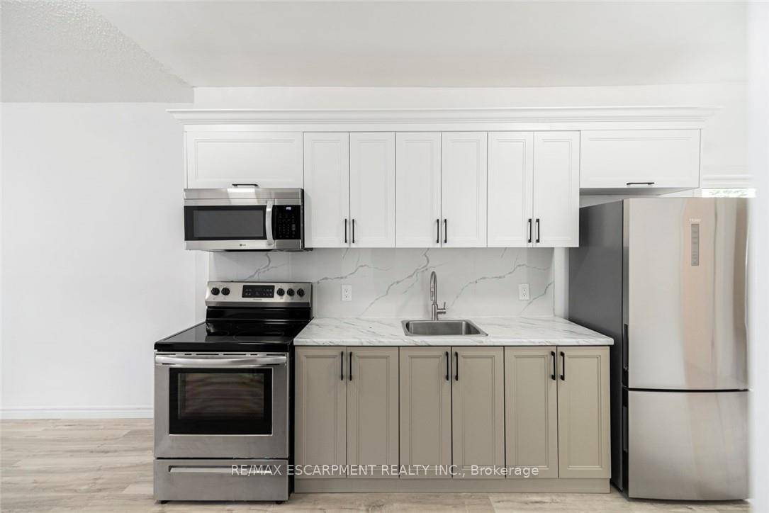 Recently updated house offering 3 1 bedrooms, 1 amp ; 1 2 baths.