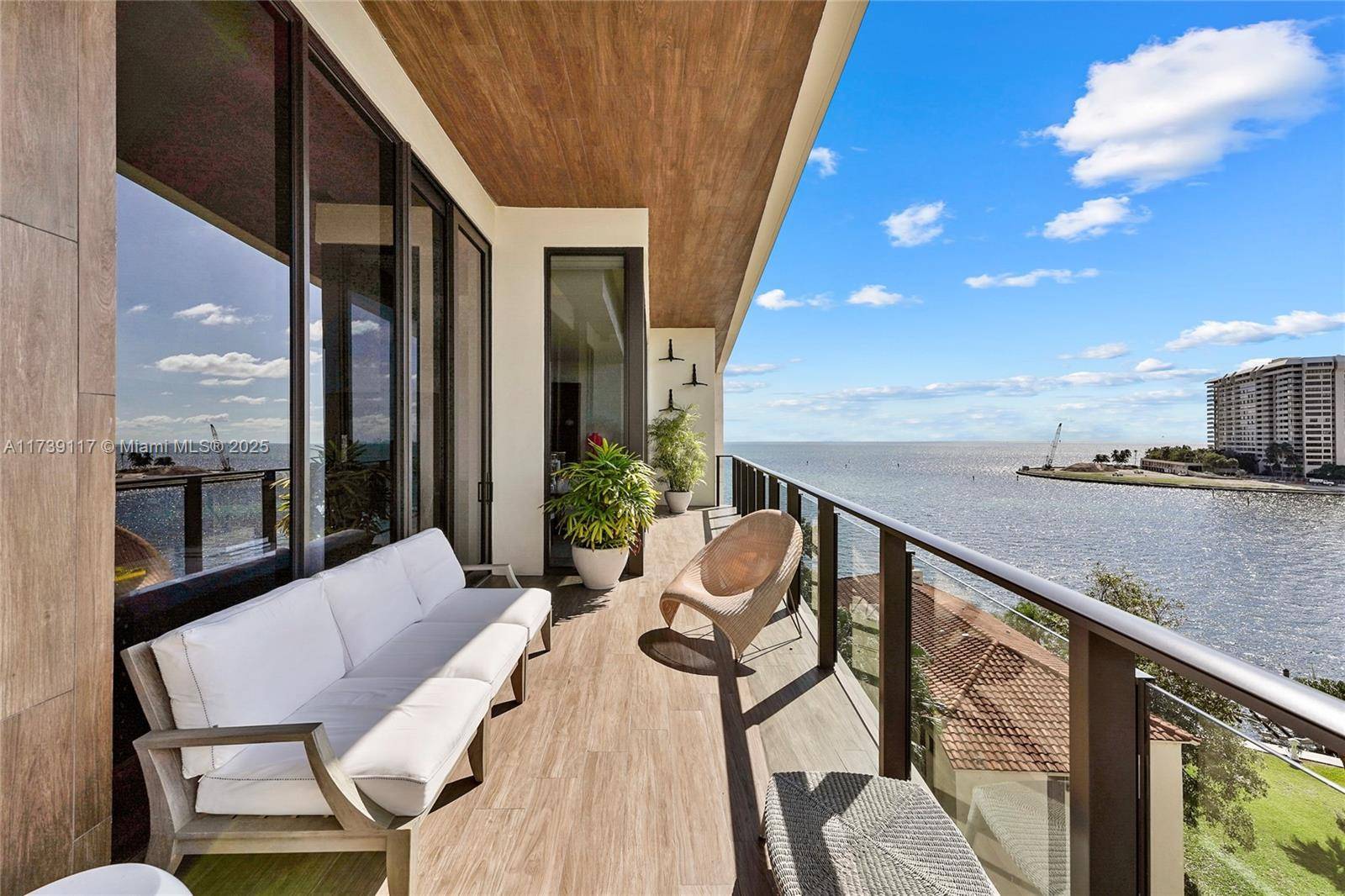 Penthouse 605 at The Fairchild Coconut Grove offers a rare opportunity to own one of just 26 waterfront residences in this boutique building by architect Max Strang.