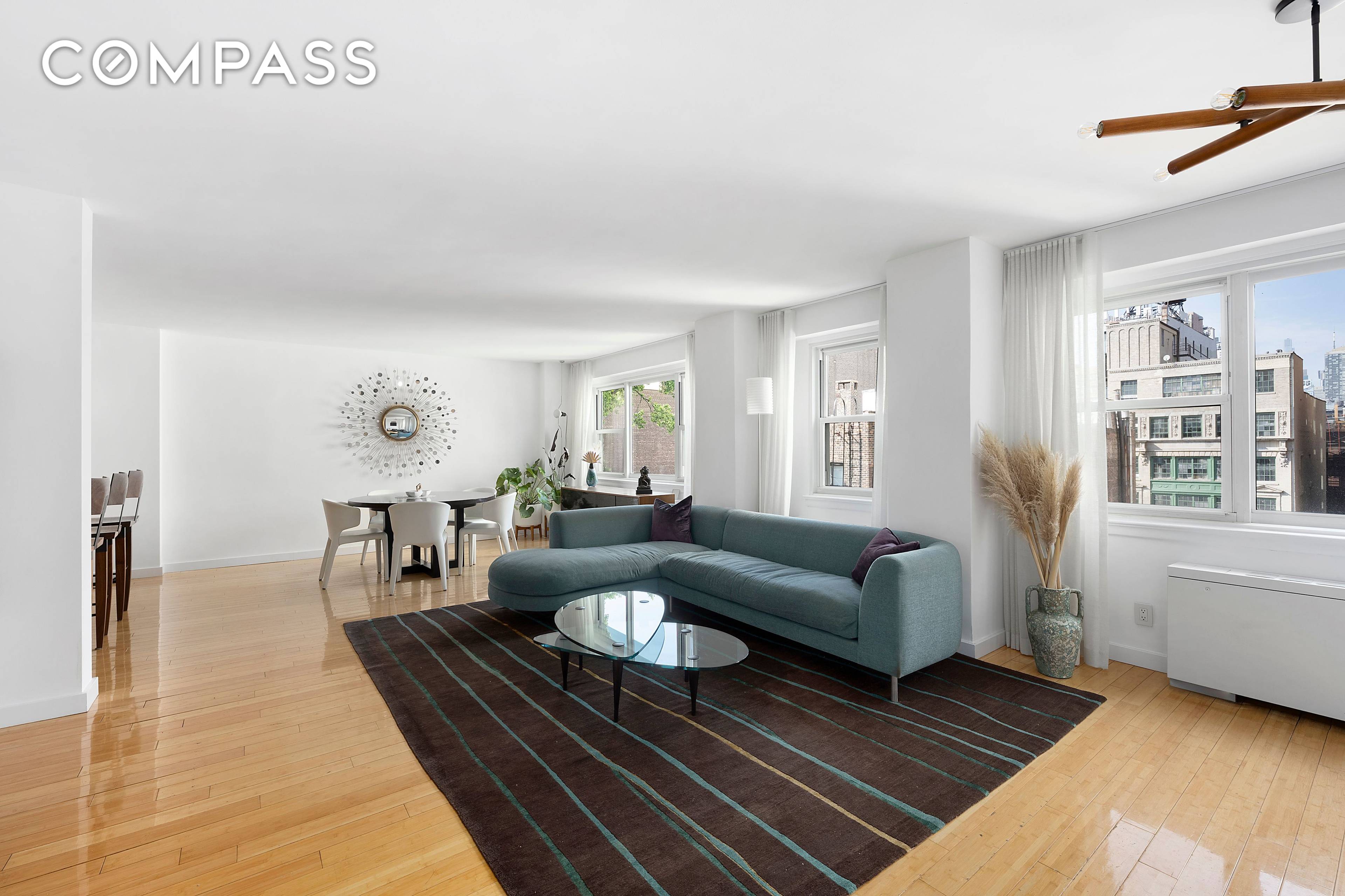 TRULY A MASTERPIECE ! Designed by an award winning architect, this townhouse like duplex has been renovated to perfection.