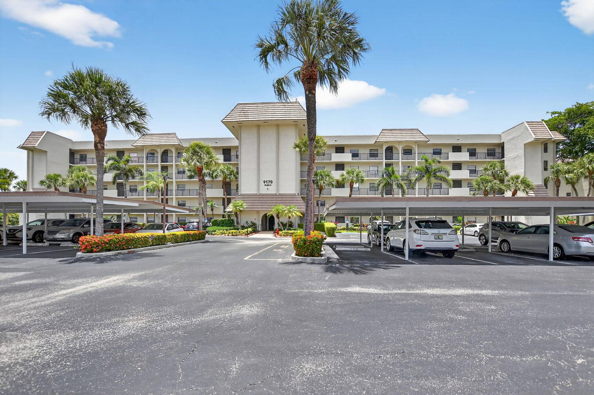 Enjoy easy first floor access in this spacious 2BR 2BA condo featuring a large enclosed Florida room with expansive garden views.