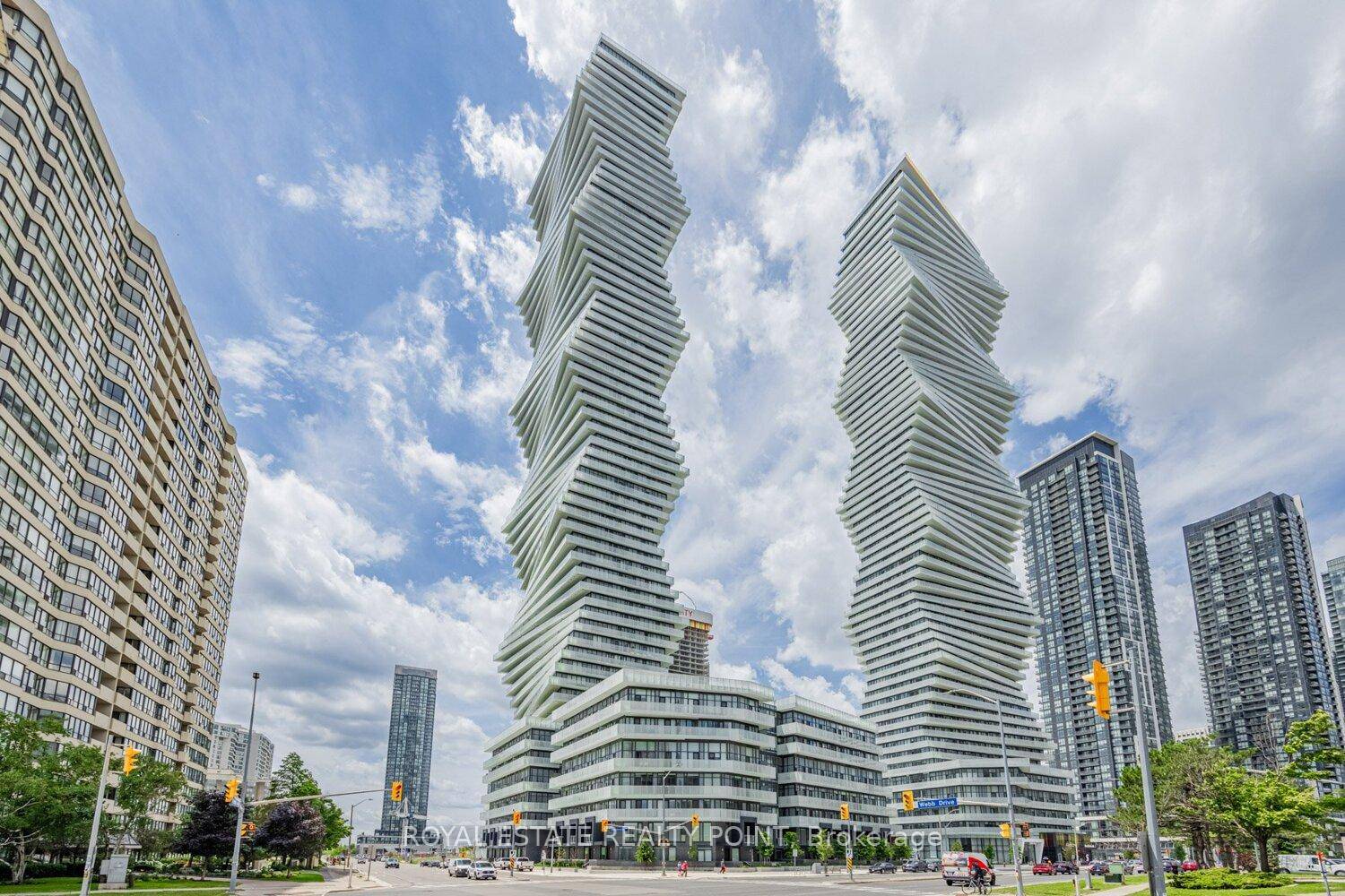 Welcome to 5703. This stunning 2 bedroom, 2 bathroom corner unit at The New Rogers Mcity 2 Condo project.