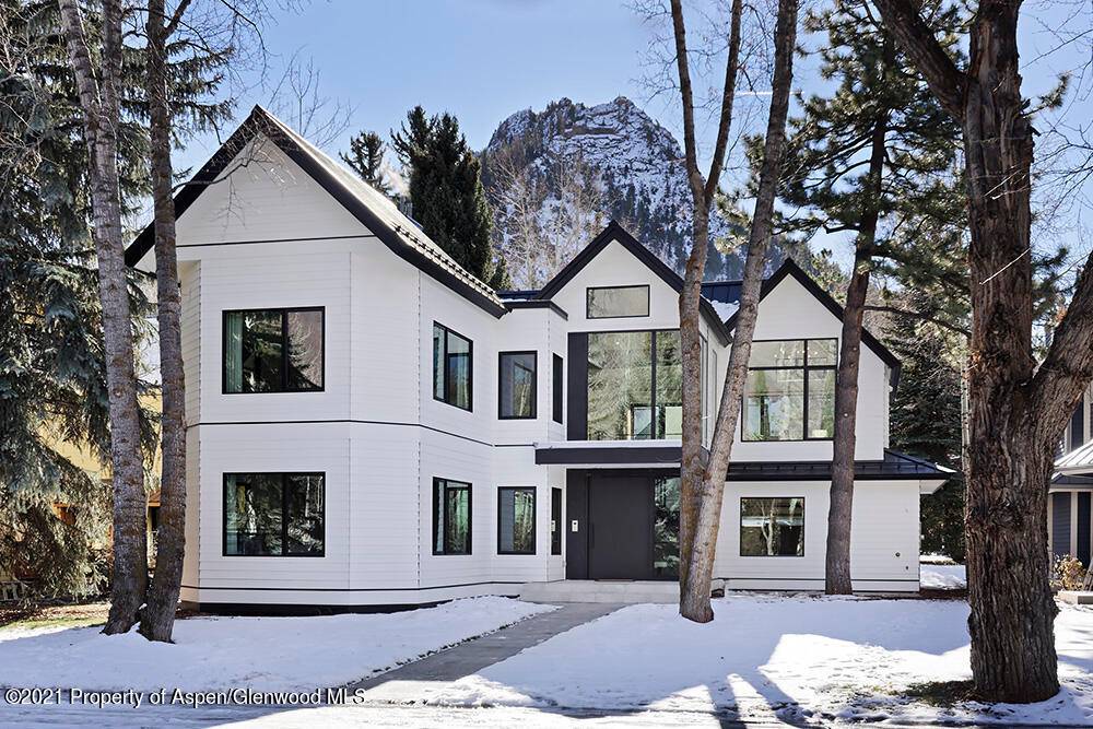 The down to the studs remodel by Z Group Architects offers intriguing finishes executed with second to none craftsmanship by S S ; Construction.