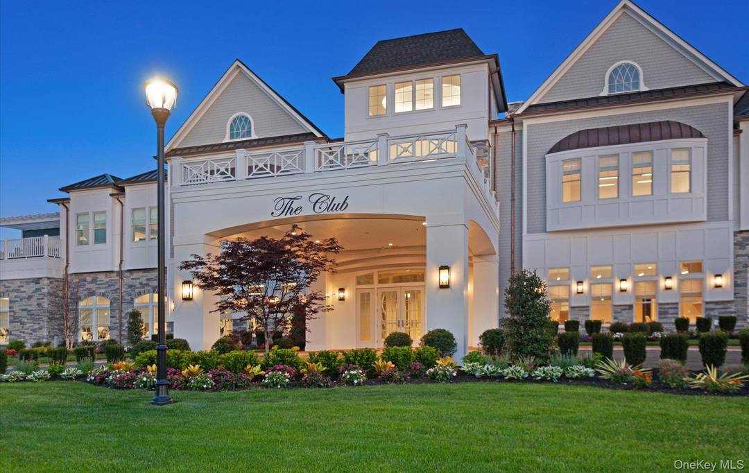 Discover refined, one level living in this very sought after Barclay model, a top floor, corner end unit in the prestigious gated community of Country Pointe, Plainview.