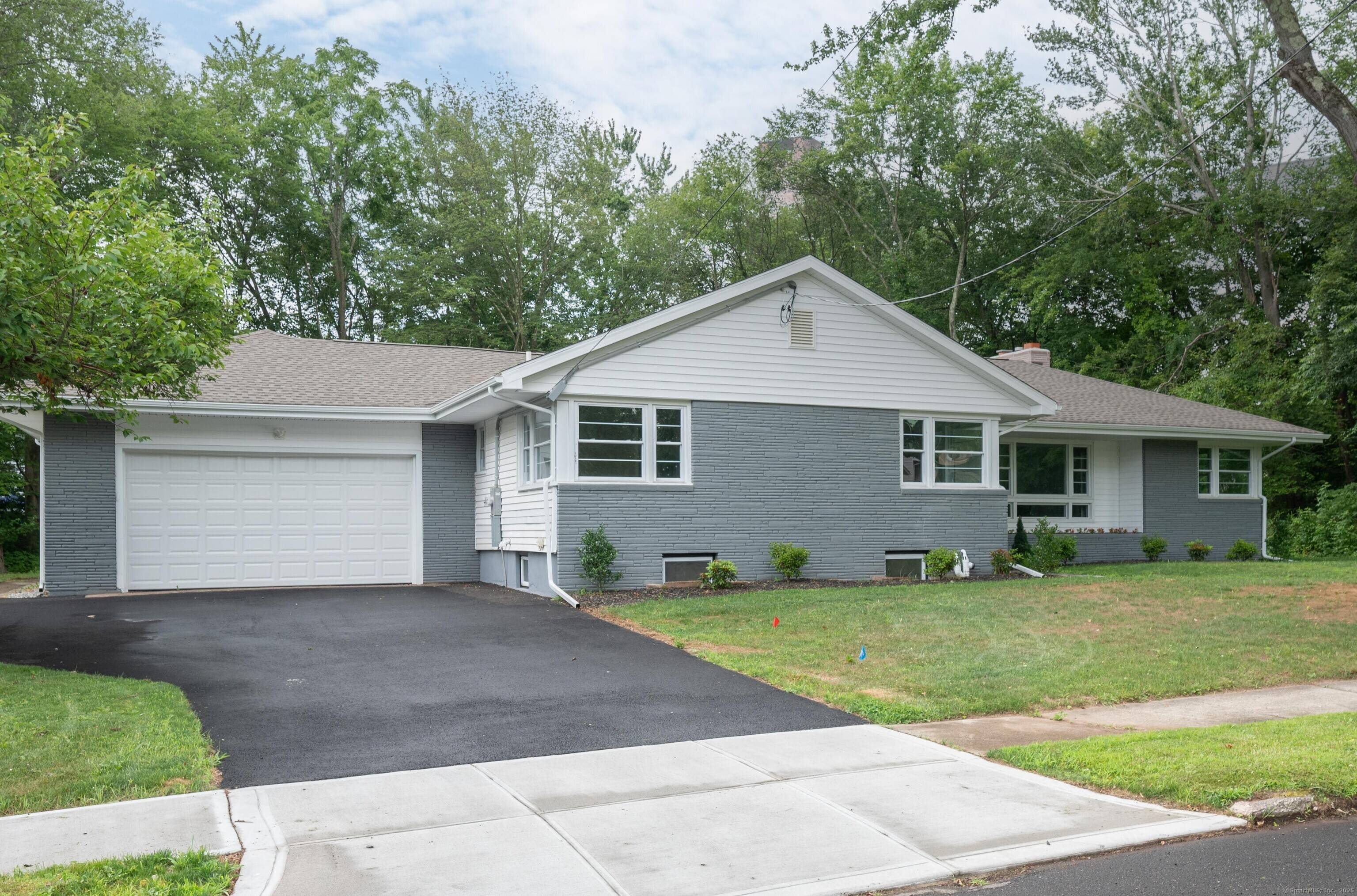 Move right into this beautifully updated 3 bedroom, 2 bath ranch with an oversized 2 car attached garage, conveniently located near Route 15 and Circular Avenue.