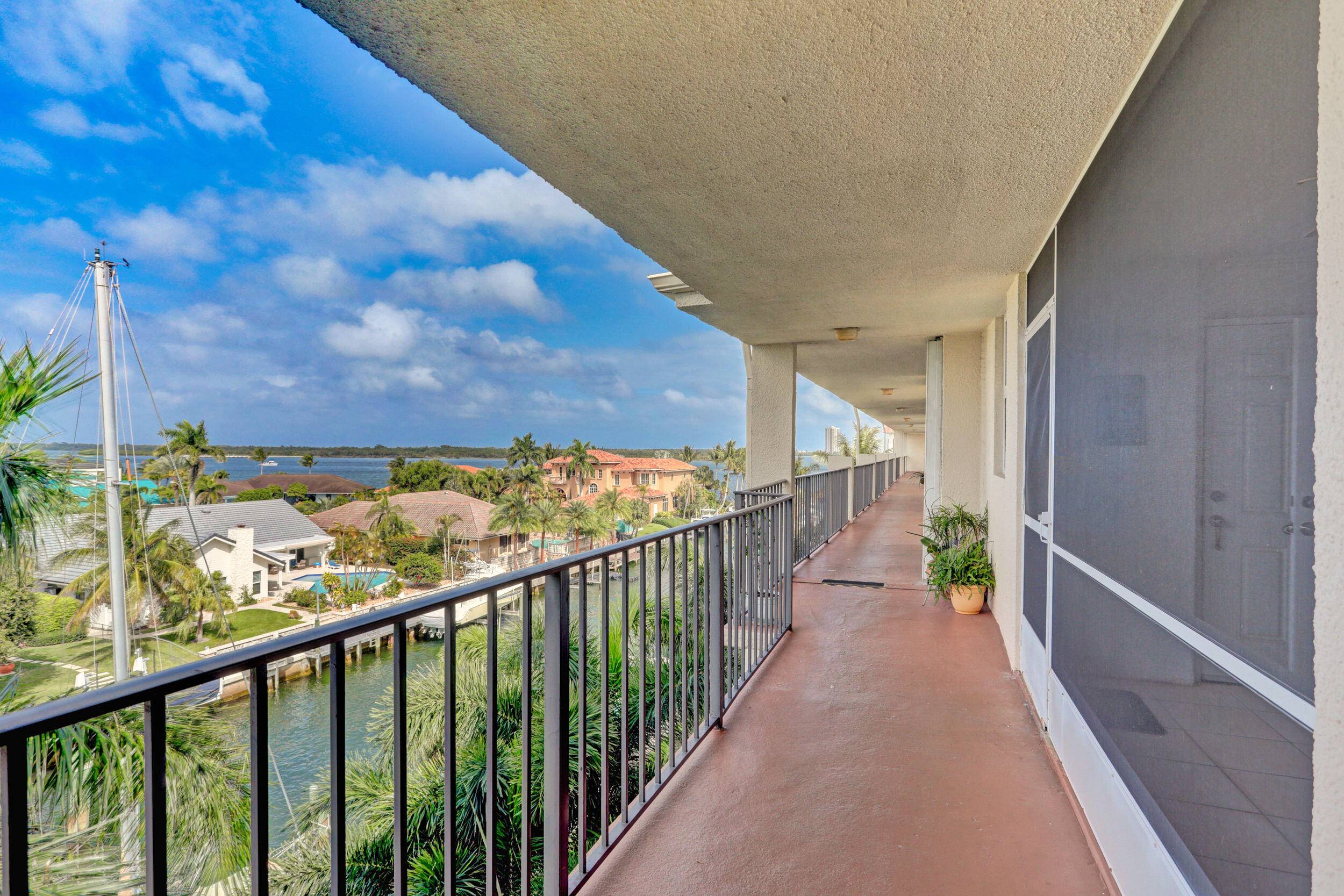 WATERFRONT with Beautiful Views of the Intracoastal from this 5th Floor Condo in the highly desirable community of Schooner Bay.