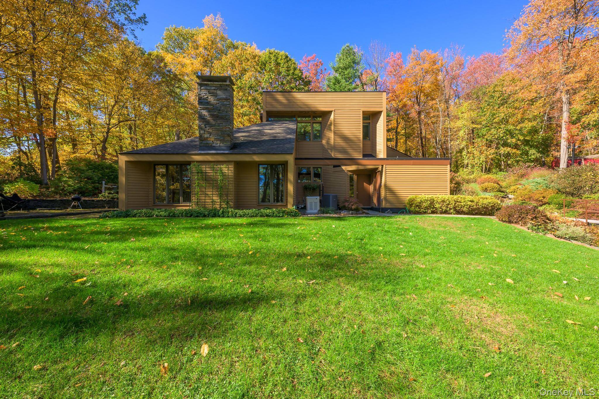 Exquisite Contemporary Retreat in Chatham Tucked away at the end of a private, tree lined drive and perched atop a hill, this one of a kind modern compound offers unparalleled ...