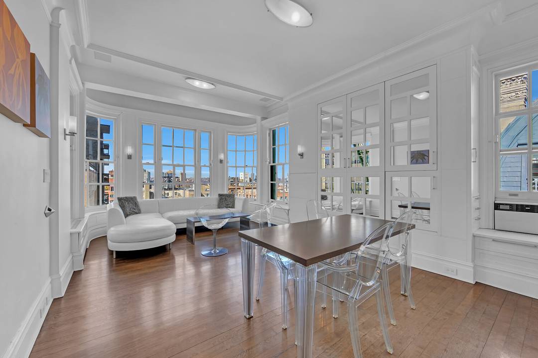 Immaculately renovated 2 bedroom apartment on the 16th floor with unique wrap around bay window facing west, north, and south.