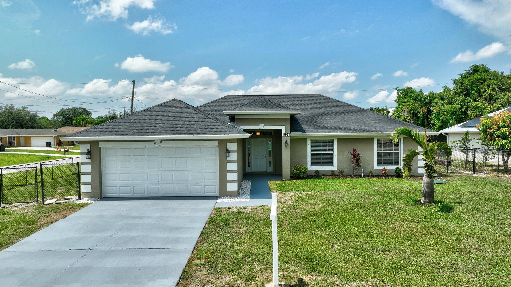 Welcome home to this beautiful 4 bedroom, 2 bath, 2 car garage gem situated on a spacious fenced CORNER LOT !