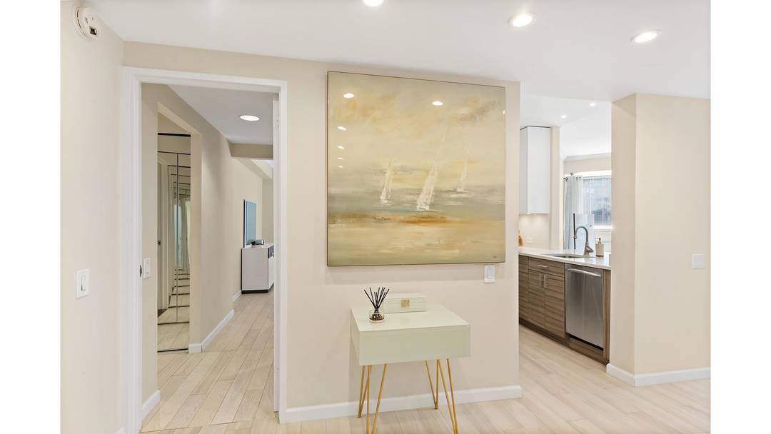 This stunning one bedroom and one and a half bathroom condo with a private balcony is being offered at the CitySpire building in Midtown West.