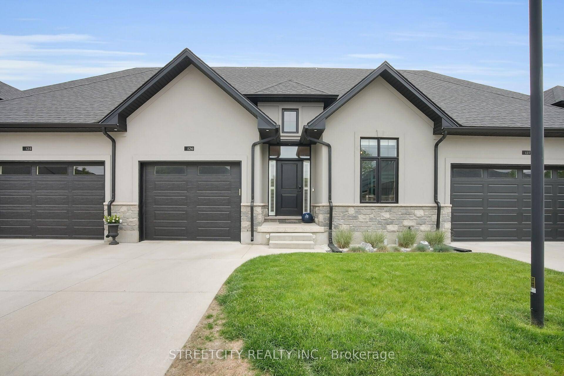 Experience refined living in this beautifully designed one floor condo with a finished basement, ideally located in the heart of Komoka.