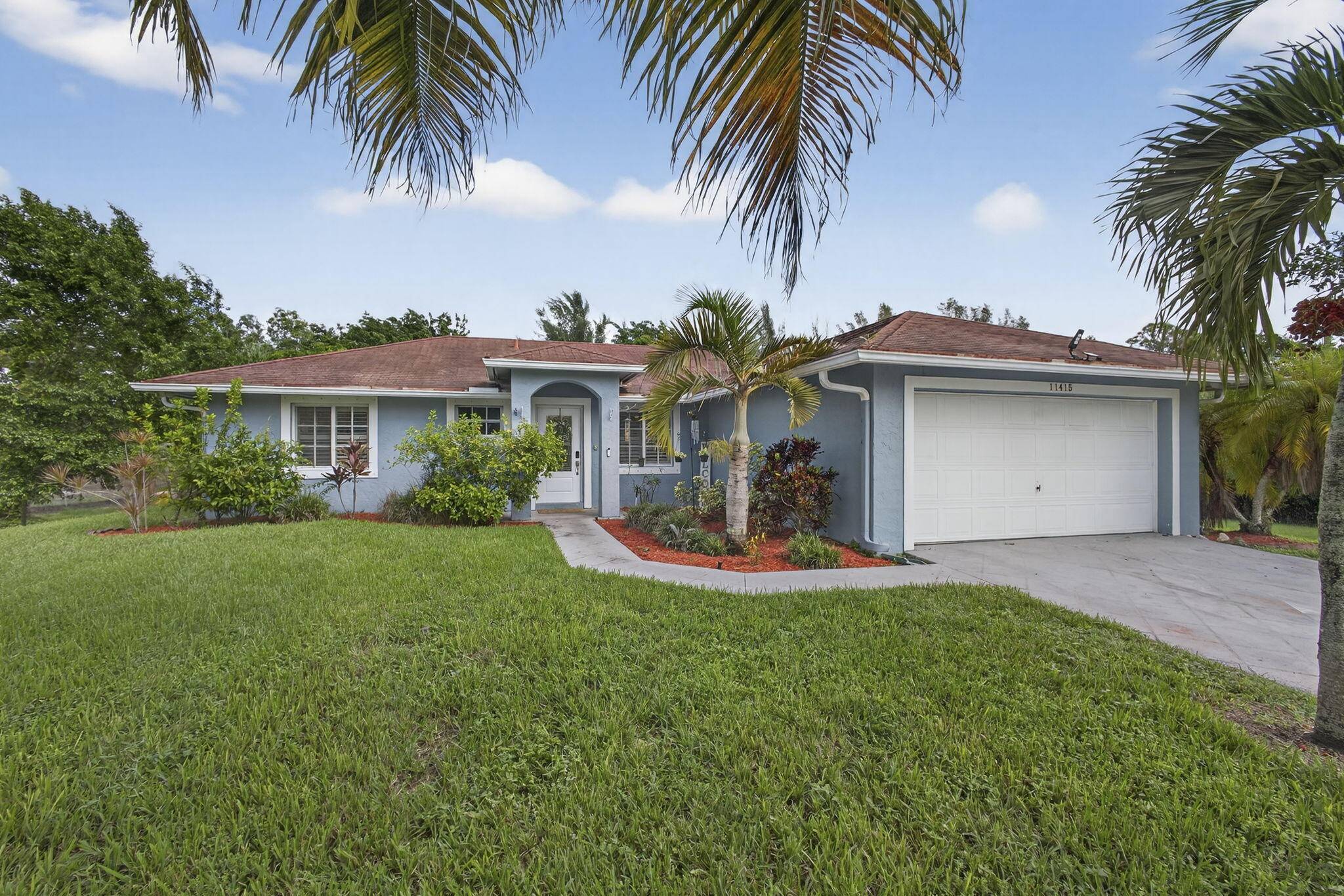 Welcome home to this charming retreat on 1.