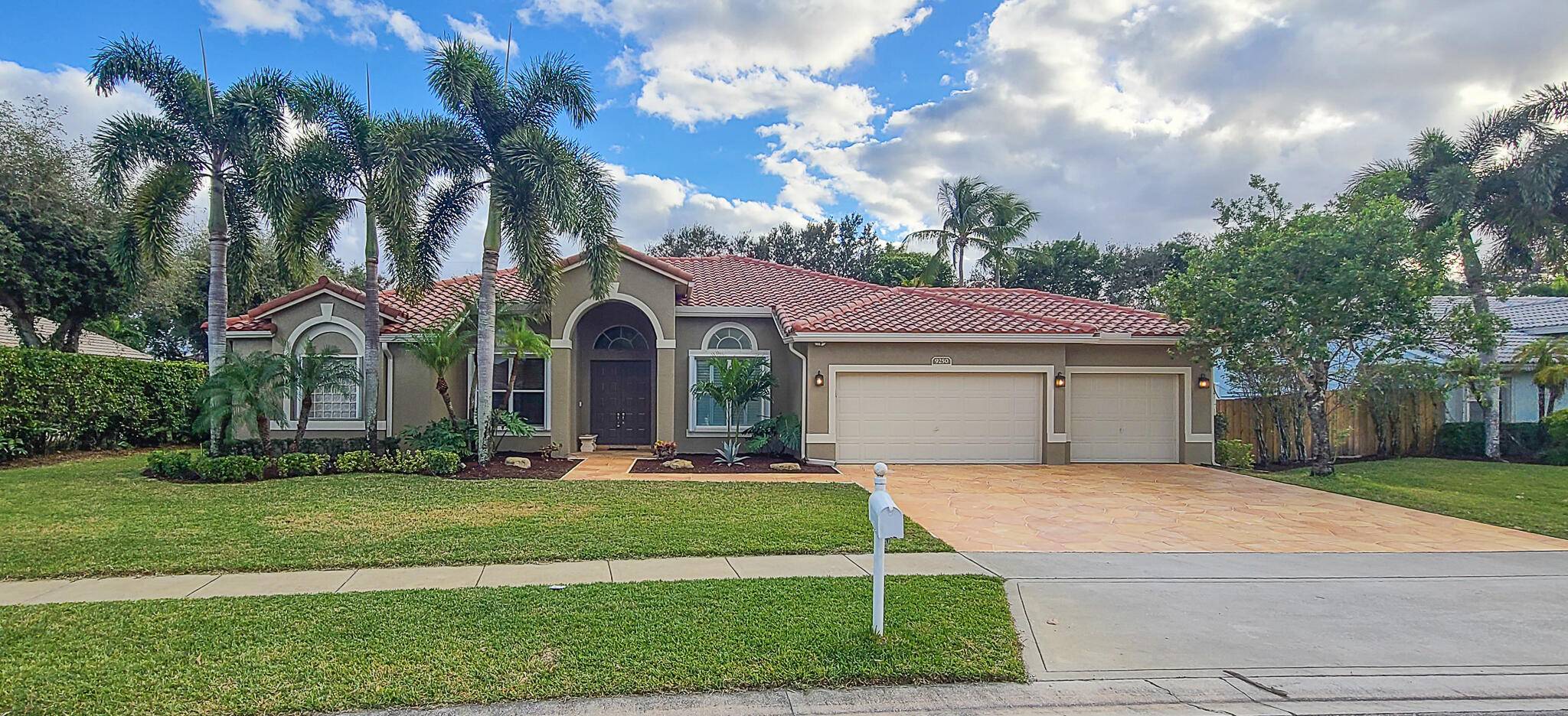BRAND NEW ROOF !... Magnificent 4 Bedroom 3 Bathroom Screened in ground pool on over 1 3 Acre with 3 Car Garage !
