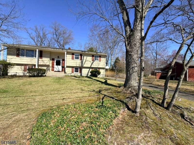 Welcome to 32 Lake Drive, a charming 4 bedroom, 2 full bath split level home set in the highly sought after Lake Intervale community.