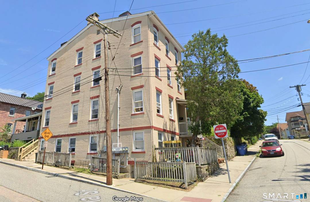 Investors take notice ! Fully occupied 4 family with separate utilities.