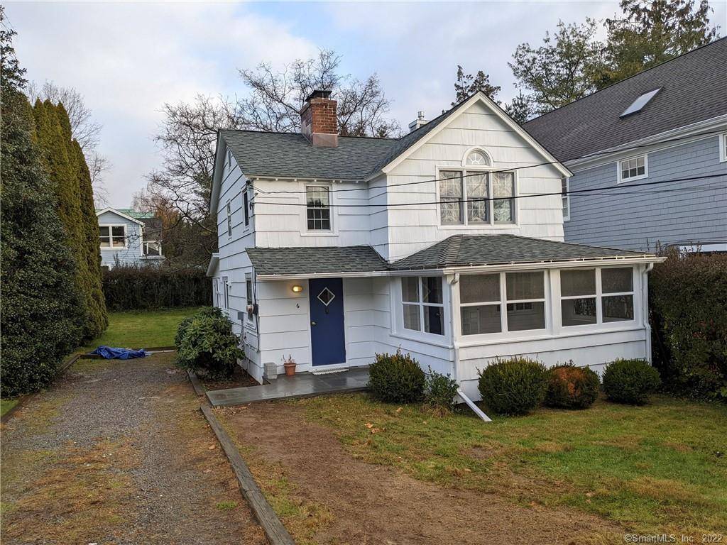 Nicely updated with fresh paint, newer floors, furnace, insulation, A C, kitchen, baths and an outdoor shower for when you return from the beach.