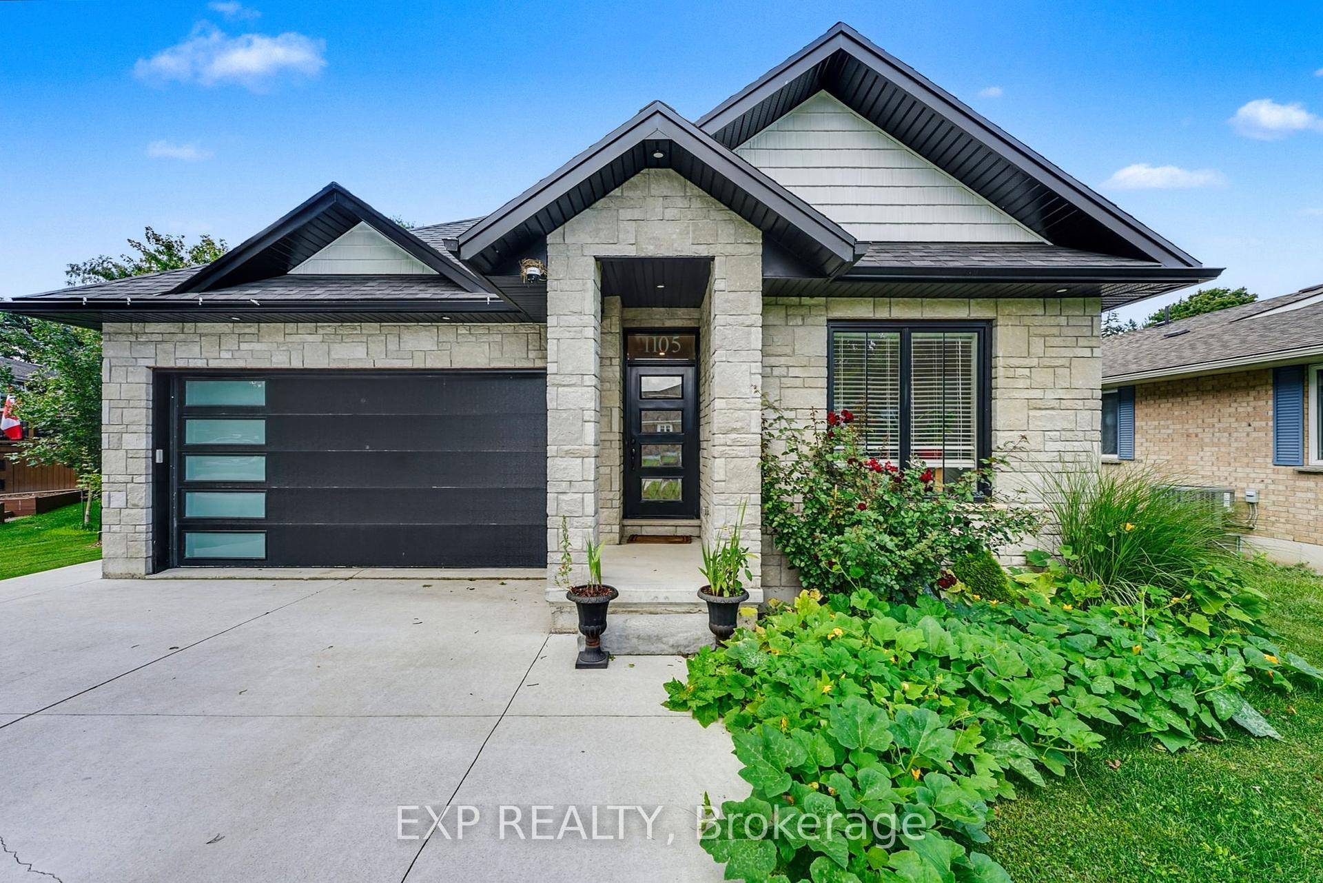 Welcome to 1105 Marietta Street, Wroxeter a beautifully built 3 year new bungalow with over 3, 000 sq ft of living space, combining modern style with peaceful country charm.
