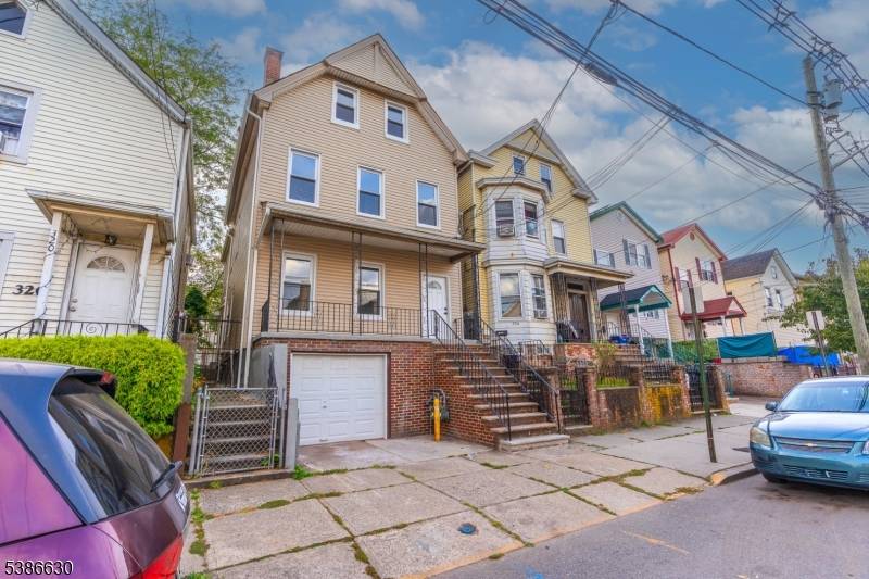 This two family home offers an attached garage and low taxes, making it a great choice for investors or owner occupants.